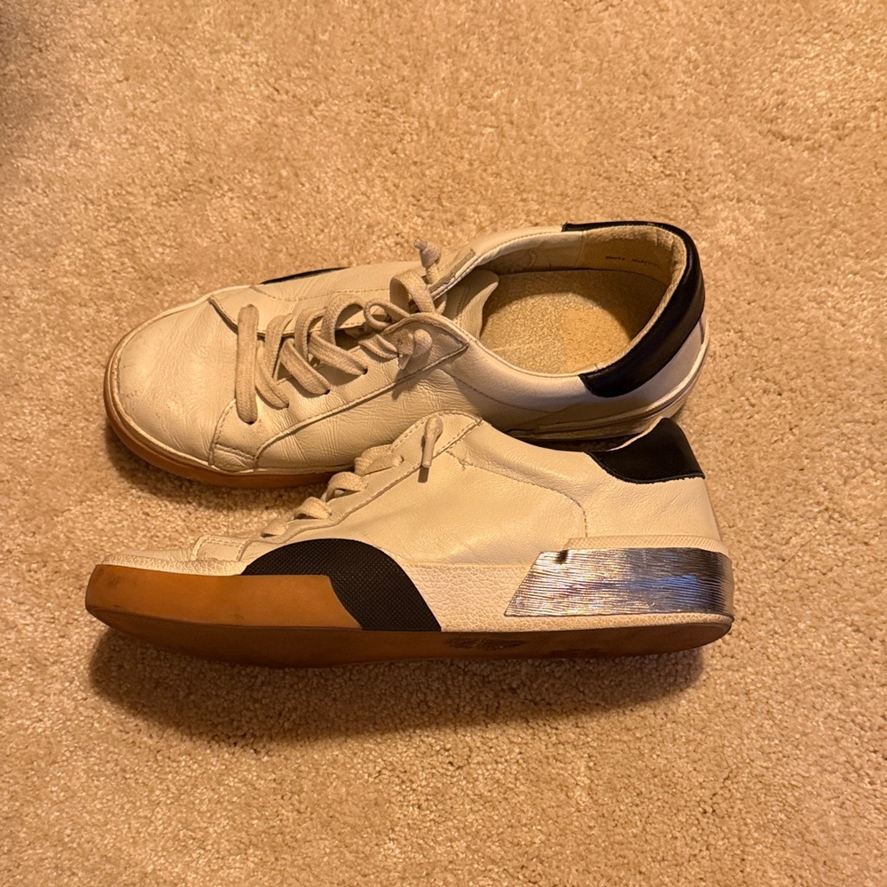 Dolce Vita Cream and Black Sneakers